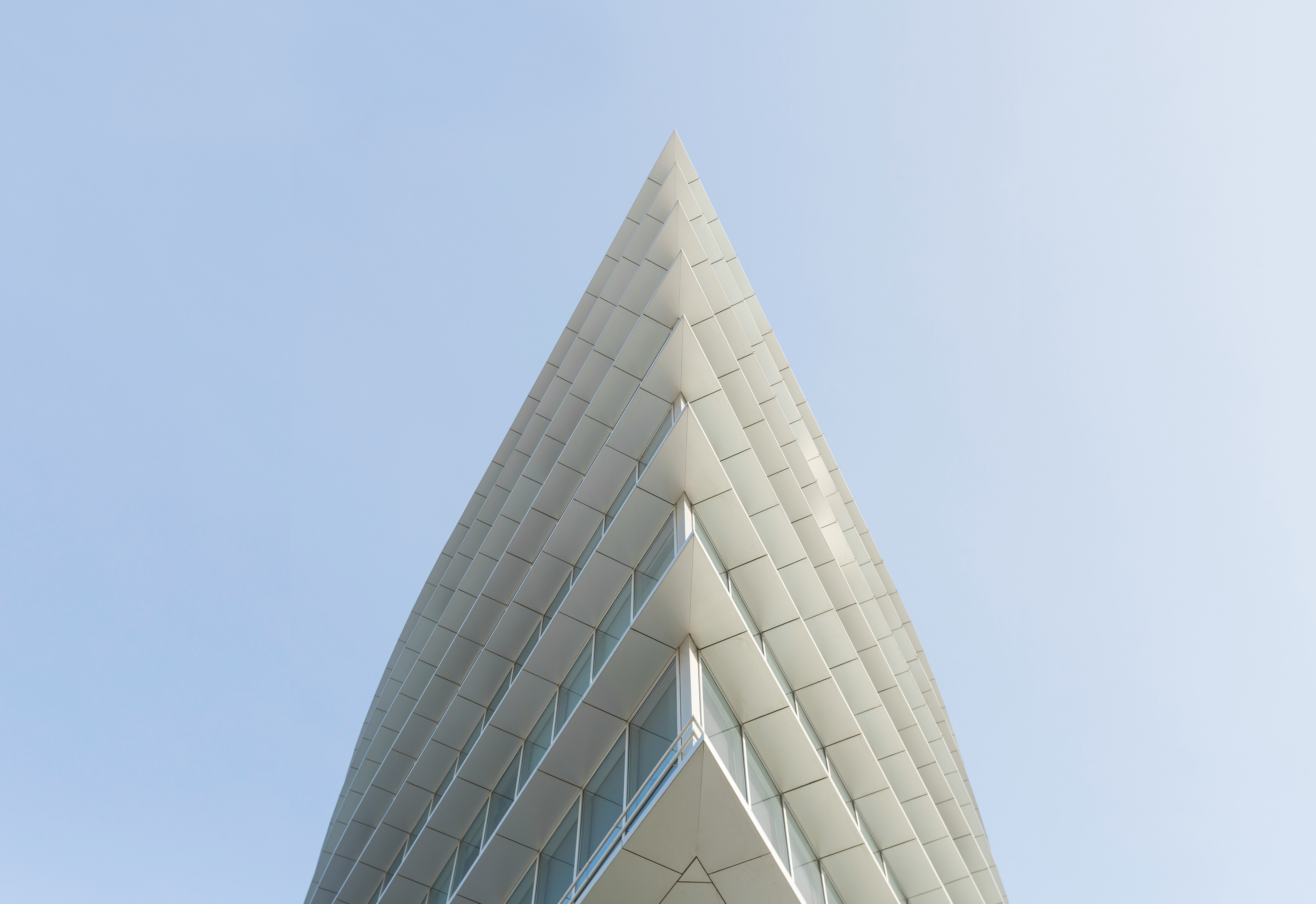 white building top under white skies