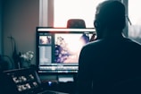 person editing photo on computer
