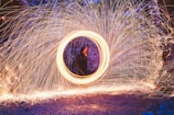 Vibrant scene of a character zooming down a steep hill with sparks flying.