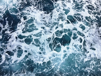 aerial photography of sea foam during daytime
