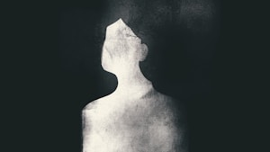 A silhouette of a person facing to the side, created using a textured effect. The image is minimalistic and uses a contrast between dark and light, with the silhouette appearing almost ghostlike against the dark background.
