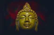 green ceramic buddha head