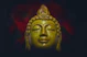 green ceramic buddha head