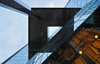 Architectural blueprint overlayed on a cityscape emphasizing vertical structures