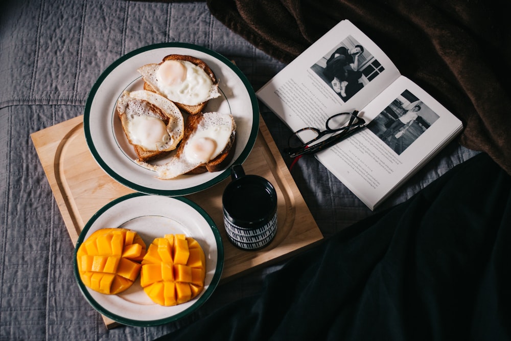 sliced mangoes served on white ceramic plate