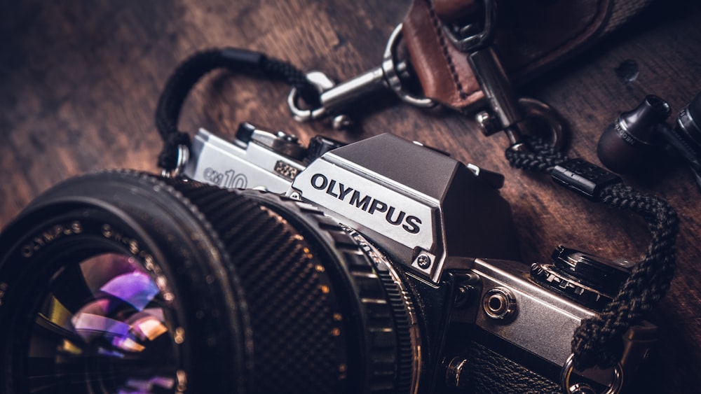 shallow focus photo of Olympus camera
