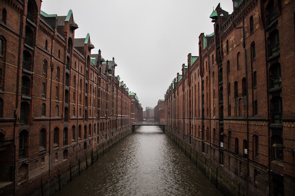 river between buildings