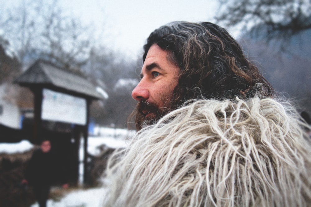 man wearing beige parka coat