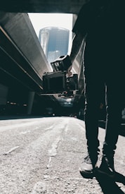 person holding camera with stabilizer