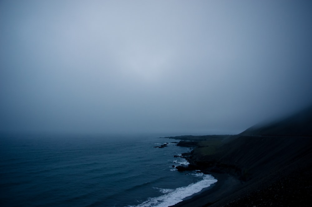 seashore covered with fog