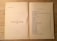 The image shows an open book on a light wood surface. The left page contains some text in Turkish, mentioning the fourth edition from 1982, and a note about the publication. The right page features a table of contents titled 'İÇİNDEKİLER', listing topics related to Bertrand Russell, philosophical and modern issues, with corresponding page numbers.