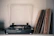 A cozy corner with vintage vinyl records spread out and a classic turntable softly glowing.