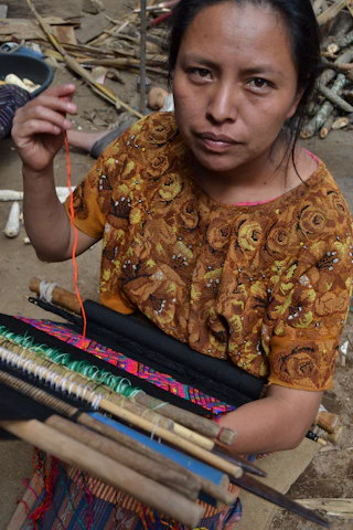 Close-up of colorful huipiles woven on a traditional waist loom from the Amuzga region.