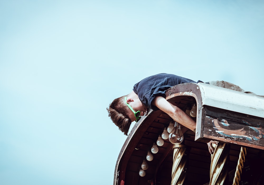 man on building roof