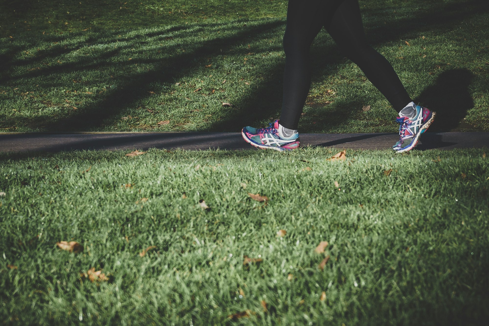 Lady running in a park in London