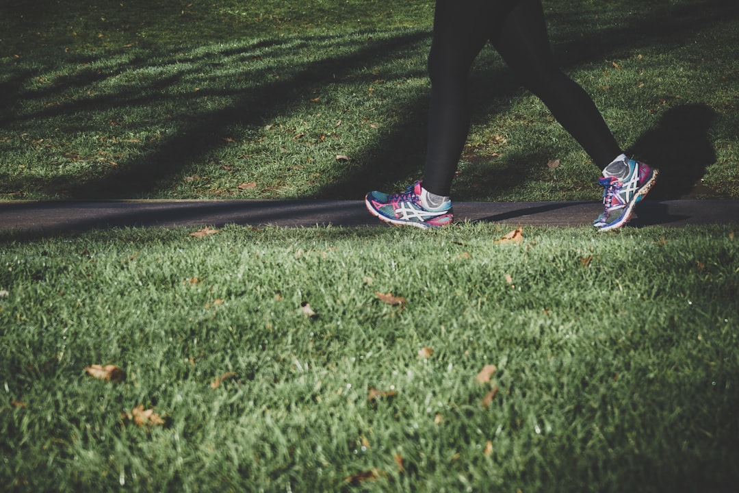 Lady running in a park in London