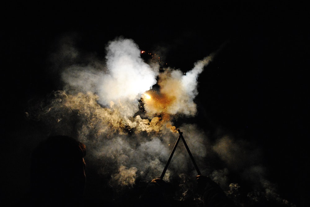 white smoke during night time