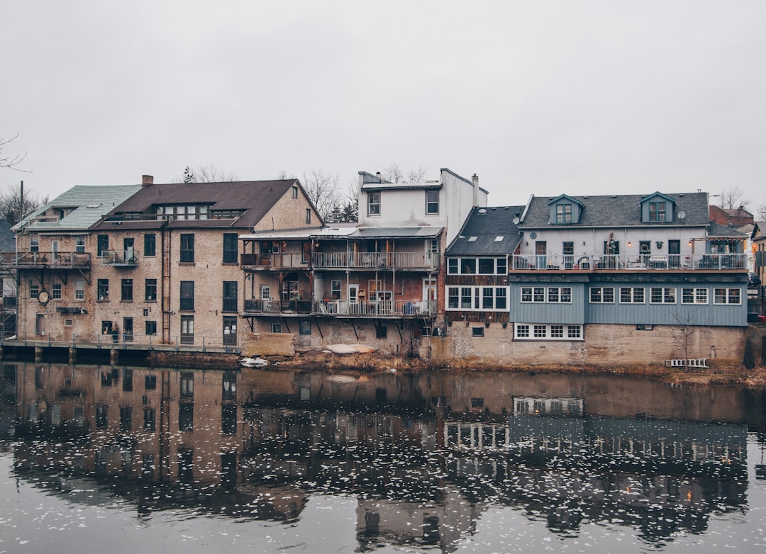 body of water near houses