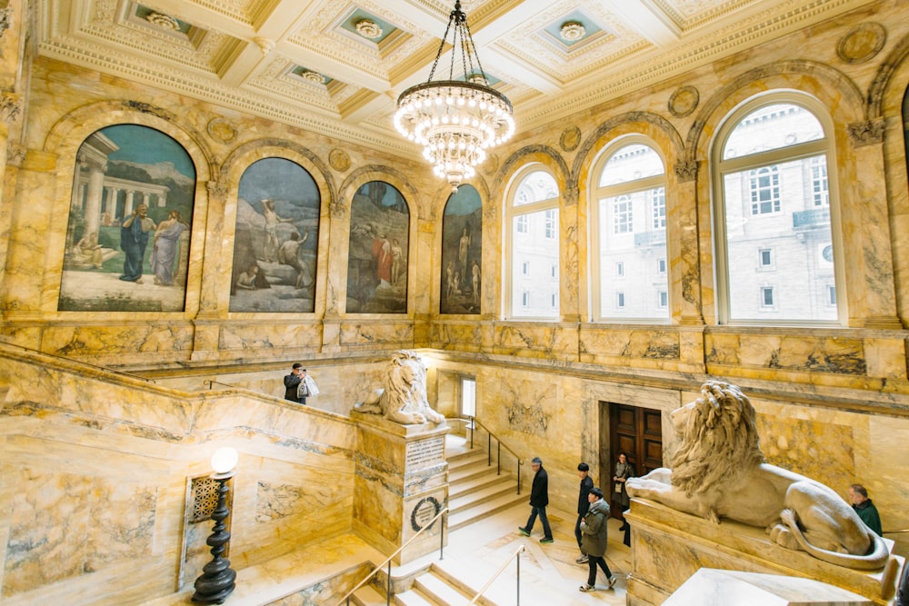 people standing inside building during daytime