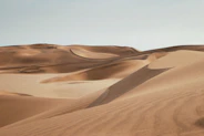 desert under clear blue sky during daytime