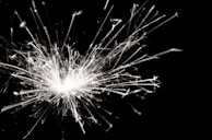 Artistic rendering of anger and frustration represented as fiery bursts near neurons.