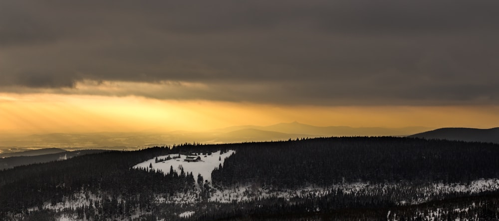 landscape photography of snow covered field during daytime