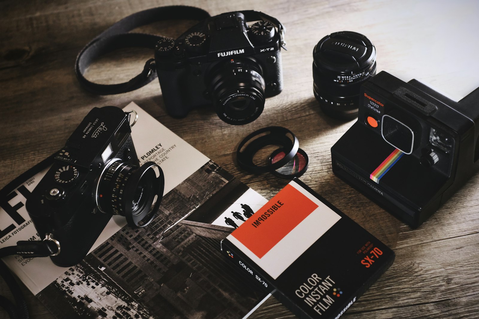 Fujifilm X100F sample photo. Black box surround by photography