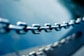tilt shift lens photo of stainless steel chain