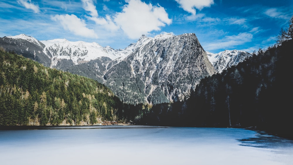 gray mountain covered with snow during daytime