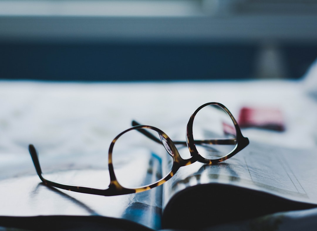 tortoiseshell sunglasses, Glasses and a magazine