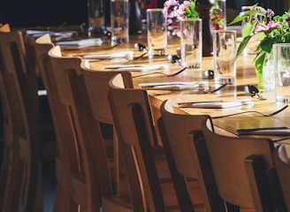 dining table with drinking high glass and fork