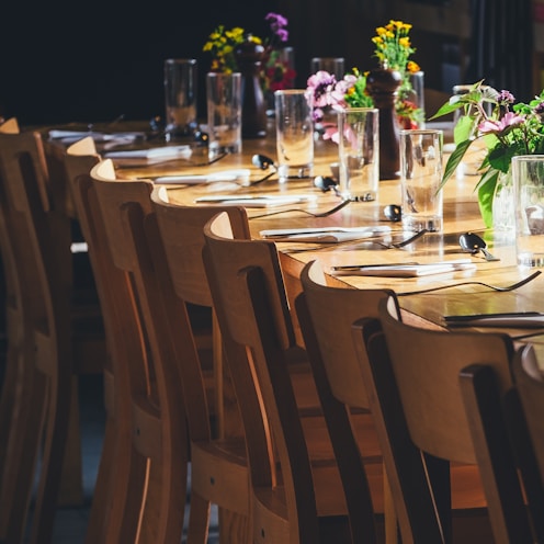 dining table with drinking high glass and fork