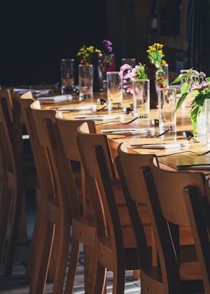 dining table with drinking high glass and fork