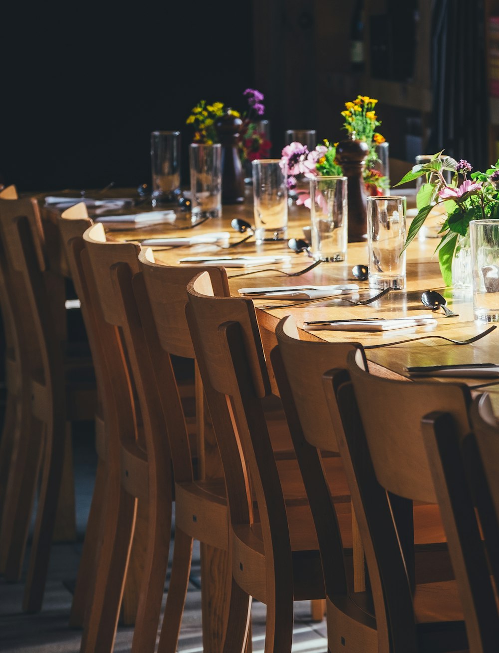 dining table with drinking high glass and fork