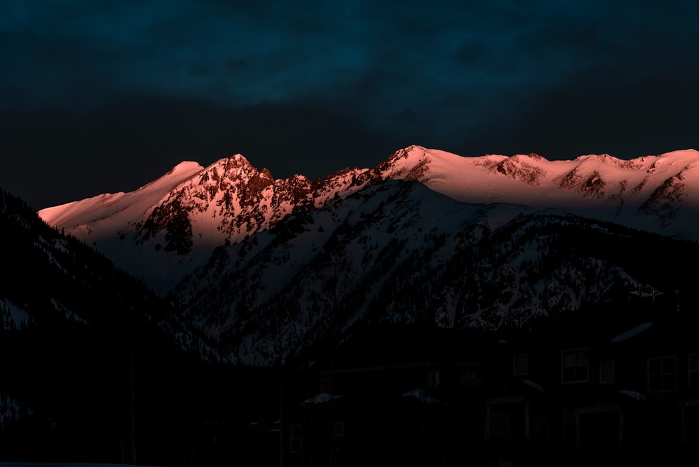 ice-capped mountain at night time