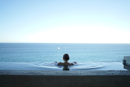 woman in water pool in Cabo San Lucas Mexico