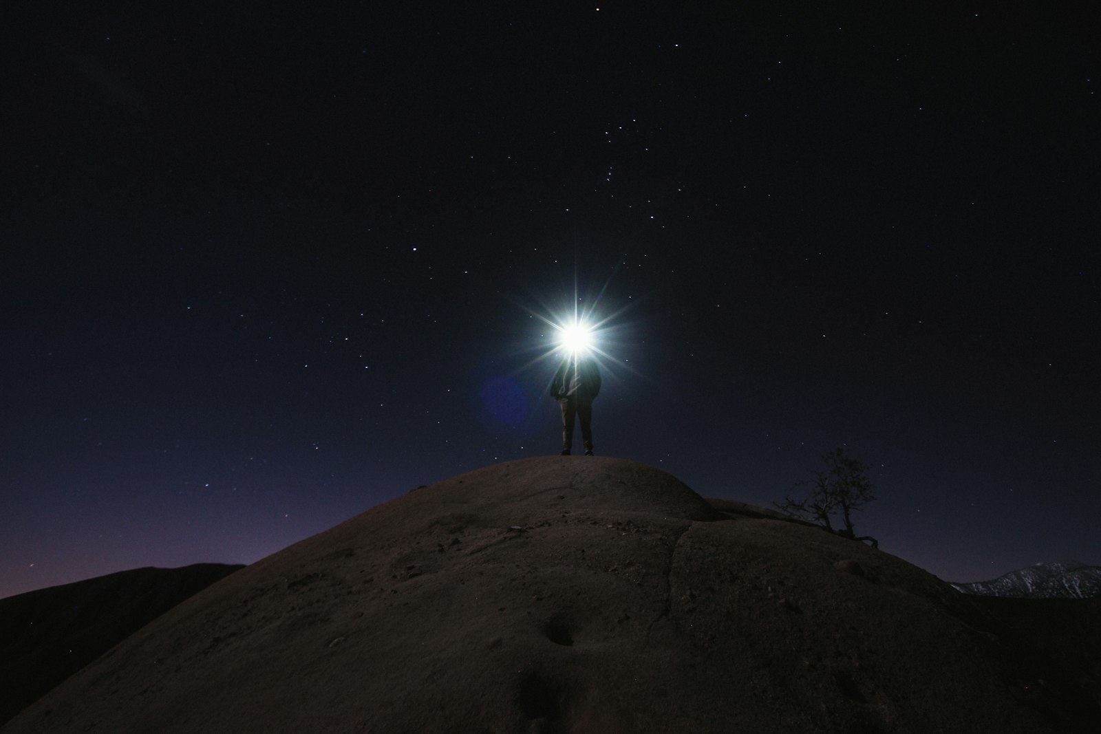 Canon EOS 7D + Canon EF-S 10-22mm F3.5-4.5 USM sample photo. Man standing on mountain photography