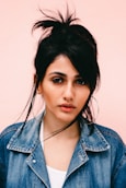 woman wearing blue denim jacket