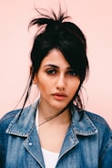 woman wearing blue denim jacket