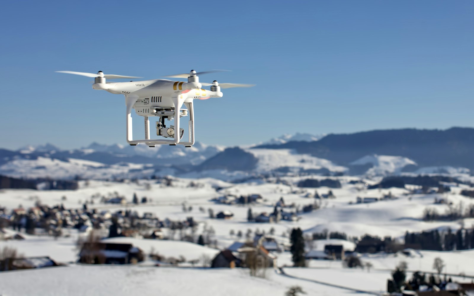 Canon EOS 5DS + Canon EF 50mm F1.2L USM sample photo. Drone over snow covered photography