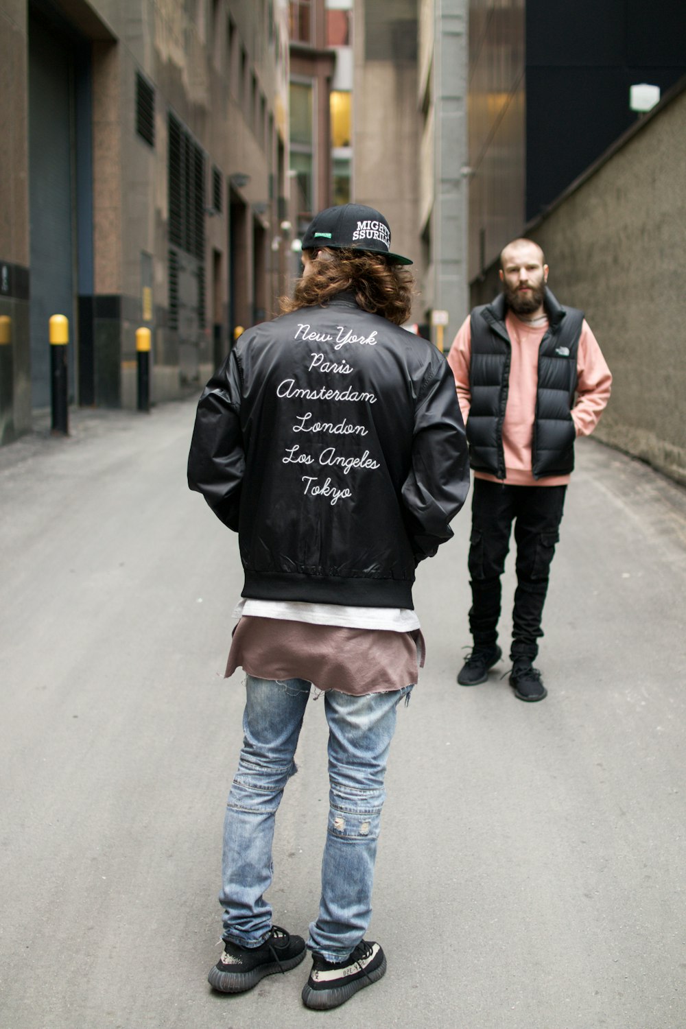 men standing on alley