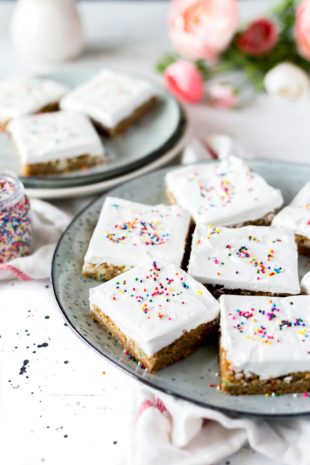 white cakes with sprinkles