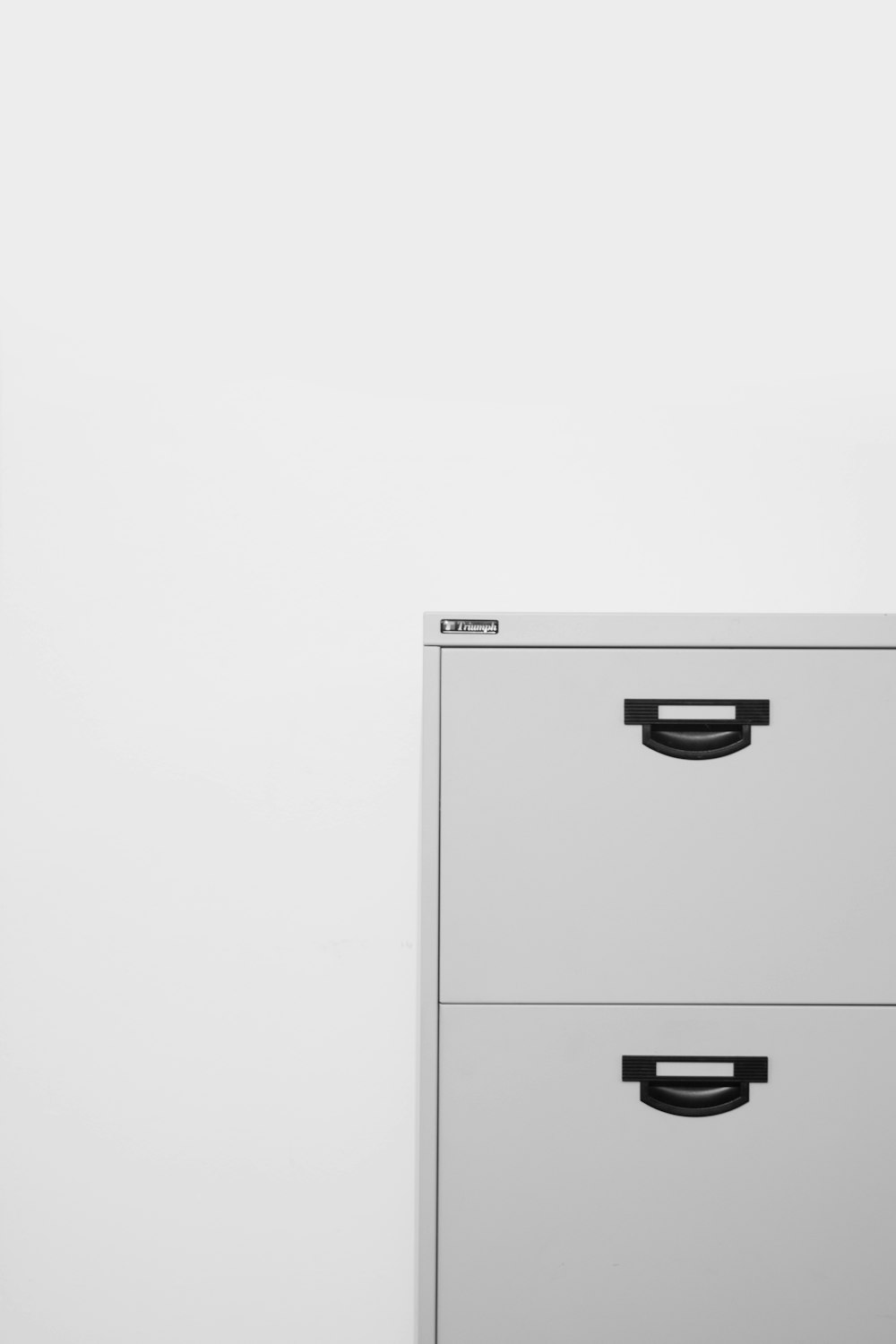 gray metal locker on white surface