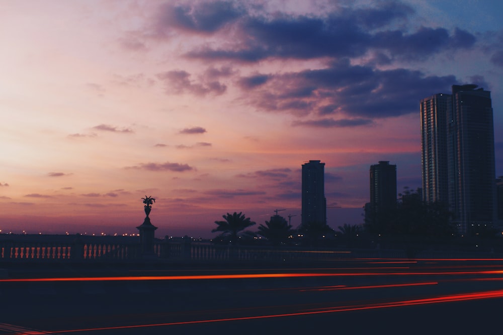 silhouette photography of high-rise buildings