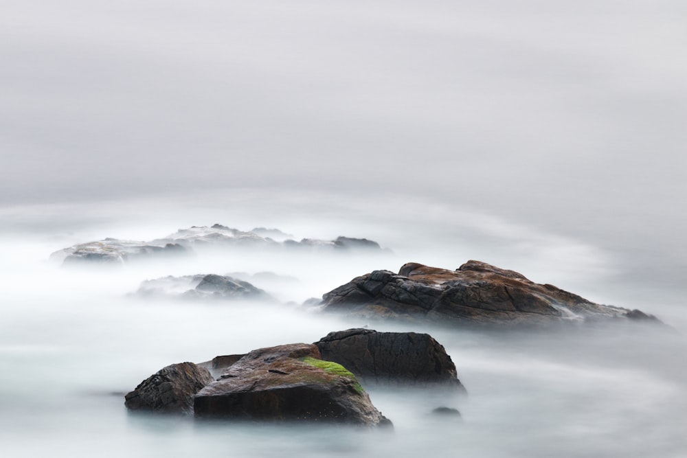 time lapse photography of water near island