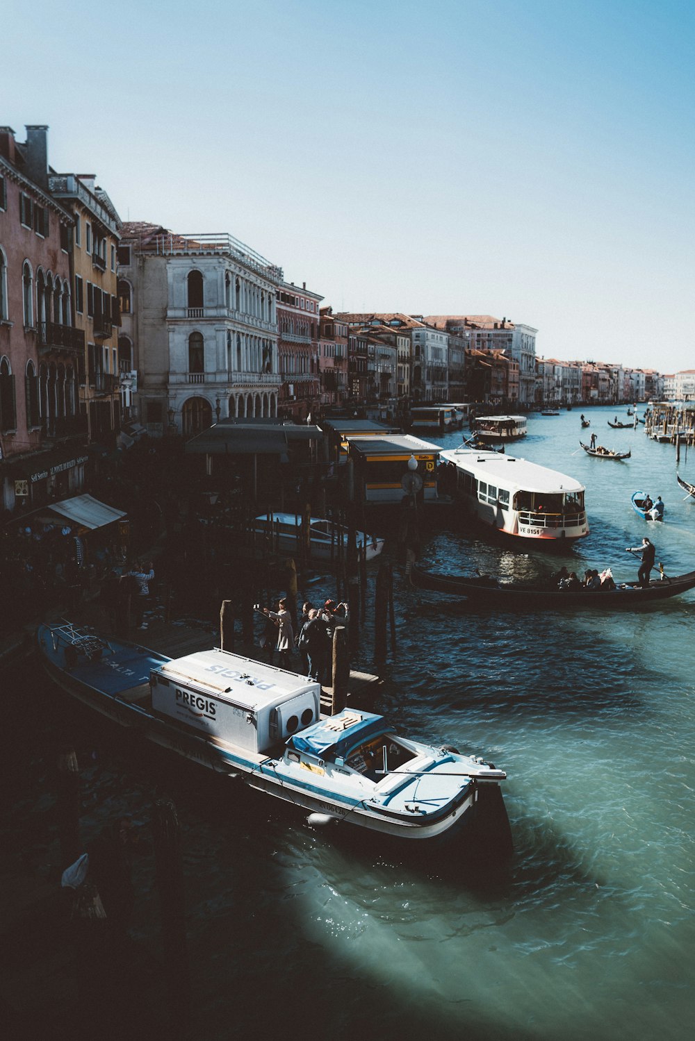 aerial view photography of motorboats near establishments