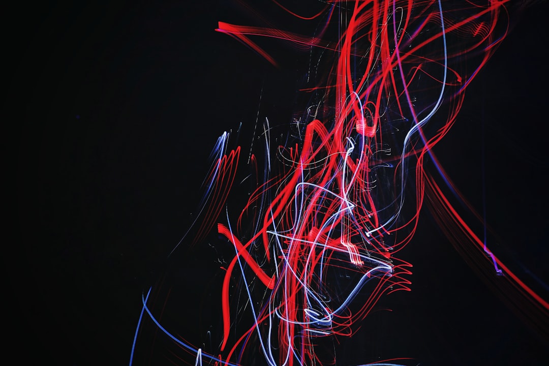 red and blue doodle artwork with black background, Exposure on the roof for 20 seconds