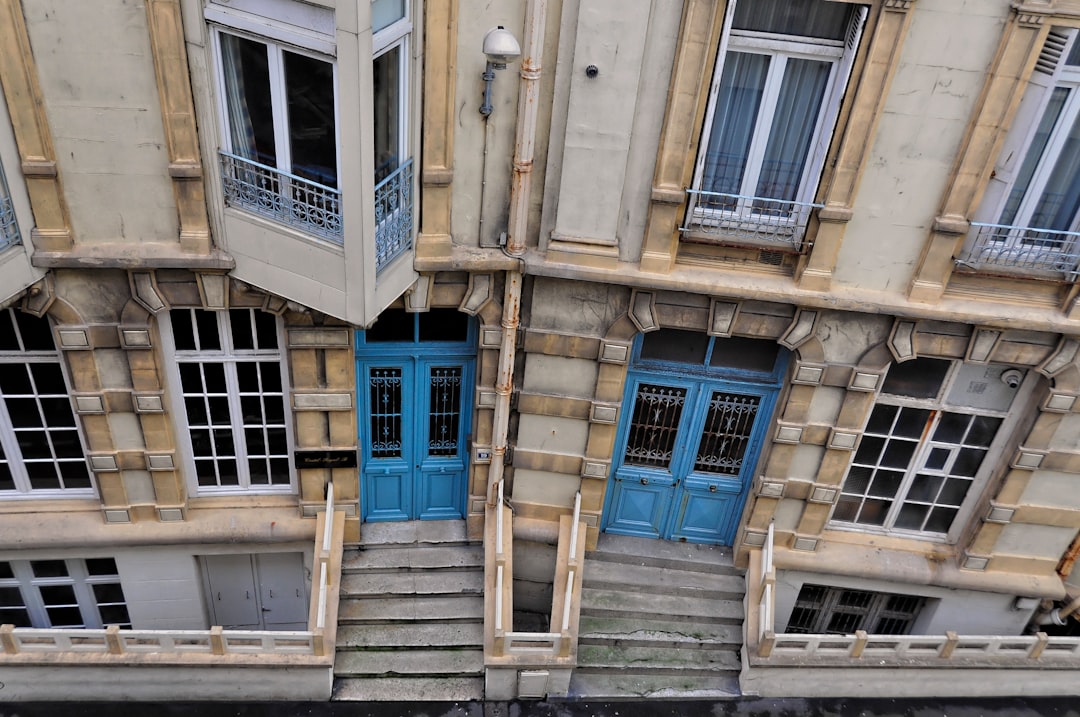 top view of beige, blue, and brown concrete building at daytime