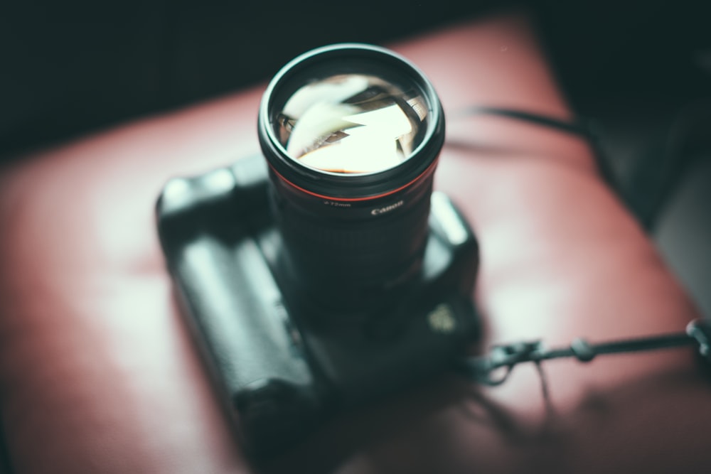 black camera in selective focus photography