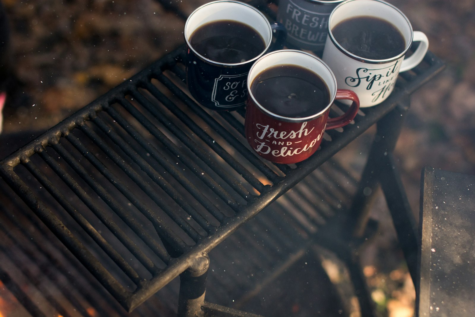 Nikon D7100 + Sigma 50mm F1.4 EX DG HSM sample photo. Four assorted-color ceramic mugs photography